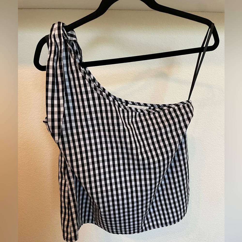 Little Lies black & white checkered one-shoulder blouse